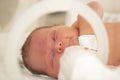 A newborn baby lies in boxes in the hospital Royalty Free Stock Photo