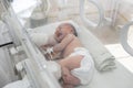 A newborn baby lies in boxes in the hospital Royalty Free Stock Photo