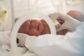 A newborn baby lies in boxes in the hospital Royalty Free Stock Photo