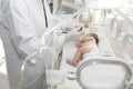 A newborn baby lies in boxes in the hospital Royalty Free Stock Photo