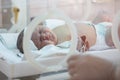 A newborn baby lies in boxes in the hospital Royalty Free Stock Photo