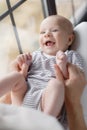 Newborn baby lying on his mother`s lap Royalty Free Stock Photo