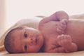 Newborn lying on its side, unclothed Royalty Free Stock Photo