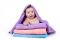 Newborn baby lying on a stack of towels Royalty Free Stock Photo