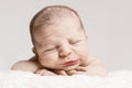 Newborn Baby Male Sleeping with Wrinkled Face Royalty Free Stock Photo