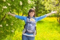 Newborn baby and mother outdoors walking with sling. Royalty Free Stock Photo