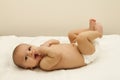 Newborn baby in nappy smiling Royalty Free Stock Photo