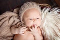 Newborn baby with open eyes. Portrait of pretty newborn boy 20 days old