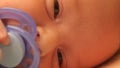Newborn baby with papilla green screen dolly shot