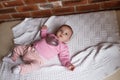 newborn baby in pink clothes in a crib, the concept of children and birth Royalty Free Stock Photo