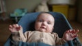 newborn baby in a rocking chair. happy family kid dream concept. lifestyle portrait newborn baby boy child. son boy baby Royalty Free Stock Photo