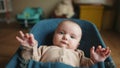 newborn baby in a rocking chair. happy family kid dream concept. portrait newborn baby boy child lifestyle. son boy baby Royalty Free Stock Photo