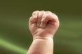 Newborn baby`s hand clenched into a fist Royalty Free Stock Photo