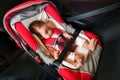 newborn baby sitting in infant car seat, safety chair travelling