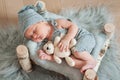 Newborn baby sleeping, asleep on bed