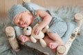 Newborn baby sleeping, asleep on bed