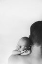 Newborn baby sleeping on daddy`s shoulder Royalty Free Stock Photo