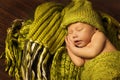 Newborn Baby Sleeping, New Born Kid Sleep in Green Woolen Royalty Free Stock Photo