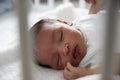 Newborn Baby Sleeping In Nursery Cot Royalty Free Stock Photo