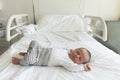 Newborn baby sleeps peacefully in the maternity hospital