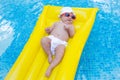 Newborn baby on summer mattress Royalty Free Stock Photo