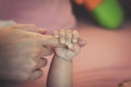 Newborn baby touching his mother hand Royalty Free Stock Photo