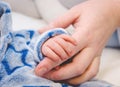 Newborn baby touching his mother hand Royalty Free Stock Photo