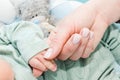 Newborn baby touching his mother hand Royalty Free Stock Photo