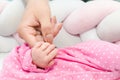 Newborn baby touching his mother hand Royalty Free Stock Photo