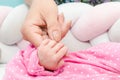 Newborn baby touching his mother hand Royalty Free Stock Photo