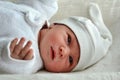 Newborn baby with warm clothes