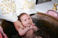 Newborn baby water baptism Royalty Free Stock Photo