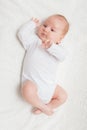 Newborn baby in white romper Royalty Free Stock Photo