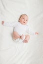 Newborn baby in white romper Royalty Free Stock Photo