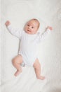 Newborn baby in white romper Royalty Free Stock Photo