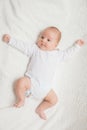 Newborn baby in white romper Royalty Free Stock Photo