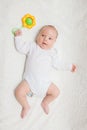 Newborn baby in white romper