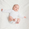 Newborn baby in white romper Royalty Free Stock Photo