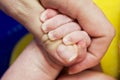 Newborn babys hand holding mothers finger. Taking care of a mother for her child. Family concept. Selected focus Royalty Free Stock Photo