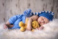 Newborn boy peacefully sleeping with his teddy bear Royalty Free Stock Photo