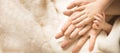 Newborn child hand. Closeup of baby hand into parents hands. Family, maternity and birth concept. Banner Royalty Free Stock Photo