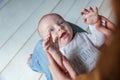 Newborn child lies on his mother`s lap Royalty Free Stock Photo