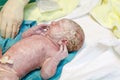 Newborn child seconds and minutes after birth. Royalty Free Stock Photo