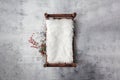 Newborn Christmas backdrop - wooden bed with white faux fur, snow covered branches with red berries on white background