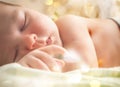 A newborn, cute, sleeping, tiny baby portrait, macro shot. Mom and her baby. The concept of a happy family Royalty Free Stock Photo