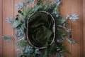 Newborn digital background - natural woven bowl with green knitted filler layer and tropical garland wreath with succulent plants