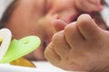 Newborn with dummy Royalty Free Stock Photo