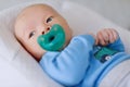 Newborn with dummy Royalty Free Stock Photo