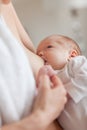 Newborn getting lactated Royalty Free Stock Photo