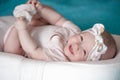 Newborn girl in a headband